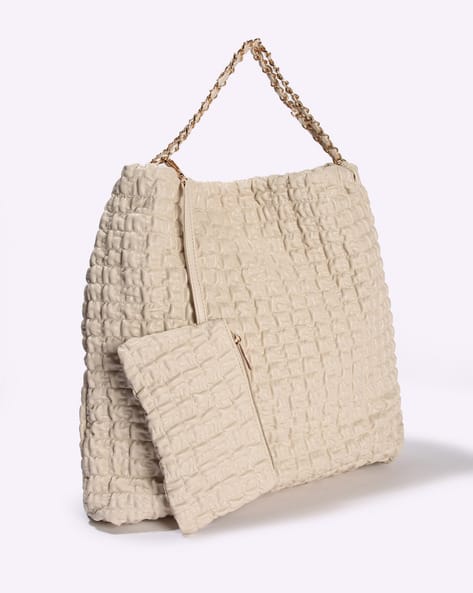 URBAN BOBBY folded small pouch cream Buy Cream Handbags for Women 
