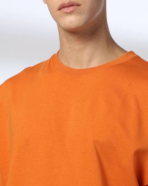 Buy Orange Tshirts for Men by DNMX Online | Ajio.com