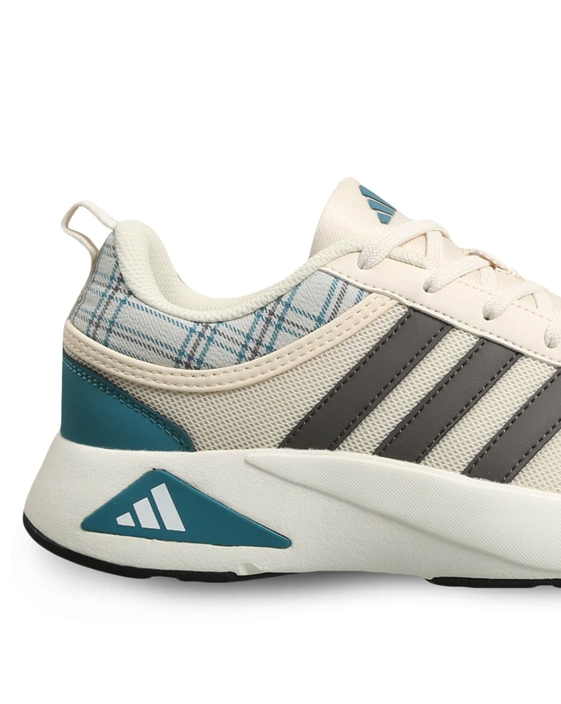 Buy ADIDAS Men Stridx Low-Top Running Shoes Online | Ajio.com