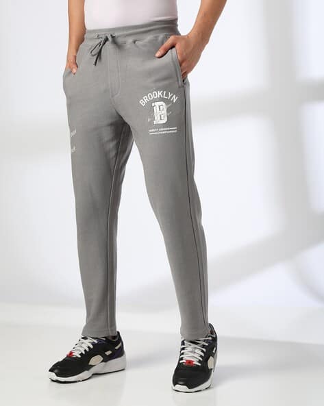 Teamspirit Men Printed Straight Fit Track Pants deal from ajio