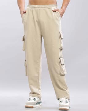 Buy TOM HIDDLE Men Baggy Fit Cargo Pants Online | Ajio.com