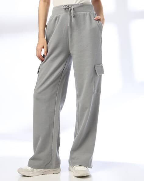 Teamspirit Women Mini Waffle Cargo Pants with Flap Pockets deal from ajio