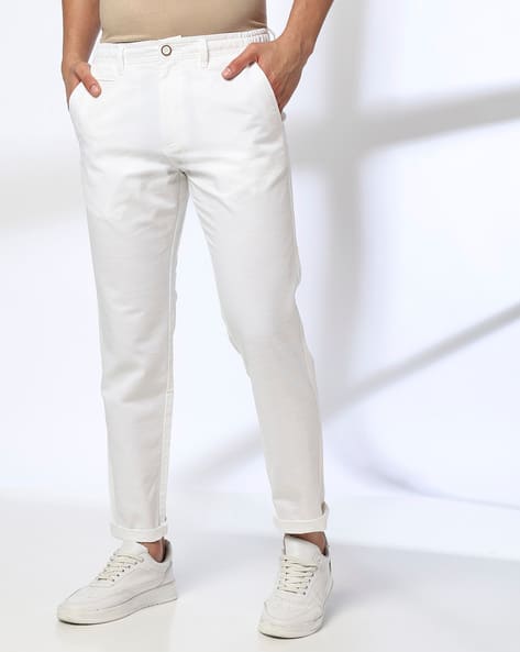 NETPLAY Men Slim Fit Flat-Front Trousers deal from ajio