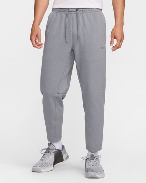 Men Primary Dri-Fit UV Tapered Versatile Straight Track Pants