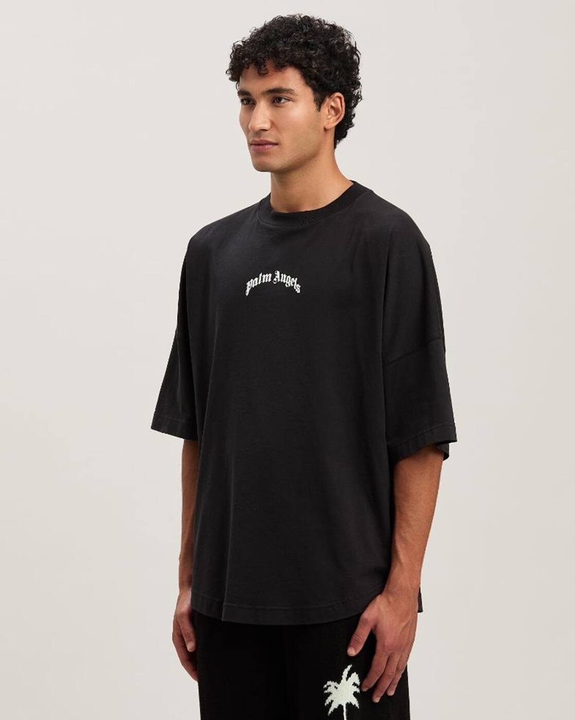 Buy Palm Angels Printed Curved Logo Oversized Fit T-Shirt | Black