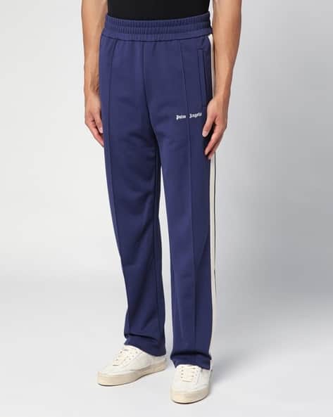 palm angels sky blue track pants Buy Palm Angels Straight Track Pants with Insert Pockets Blue Color Men  AJIO LUXE