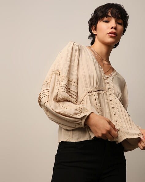 beige peplum top