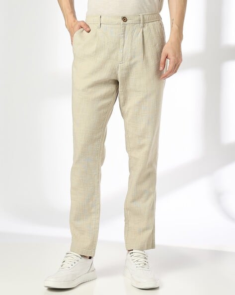 Men Mid-Rise Slim Fit Single-Pleat Chinos deal from ajio