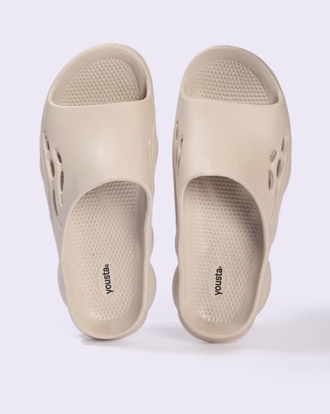 YOUSTA Men Perforated Slides deal from ajio YOUSTA Men Perforated Slides deal from ajio