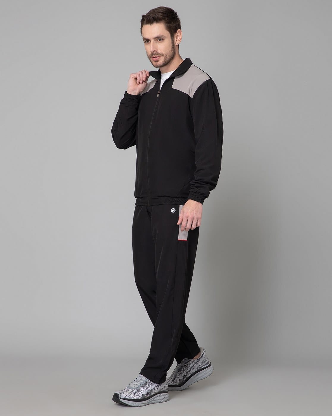 Buy TurnFIT Men Colour-block Tracksuit Online | Ajio.com