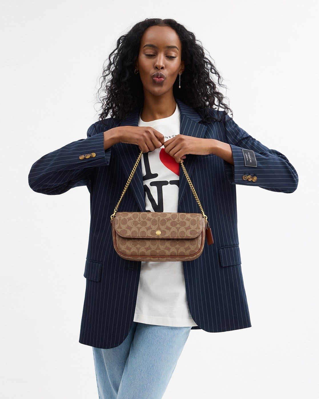 Buy Coach Signature Canvas Brook Flap Chain Small Bag | Brown