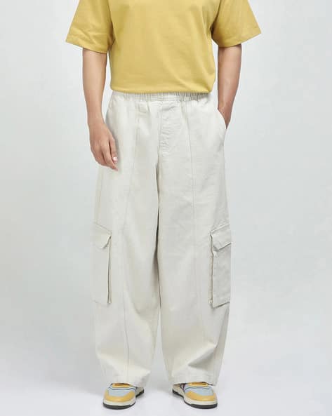 Rare Rabbit Men Baggy Fit Mid-Rise Mid-Wash Jeans with Elasticated Waist
