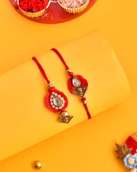 Aapno Rajasthan Kundan-Studded Rakhi with Dropped Pearl Balls