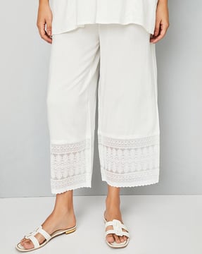 Buy MAX Women Embroidered Hem Palazzos Online | Ajio.com