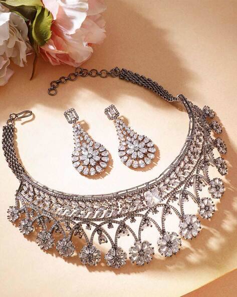 Rubans Women Silver Plated Stone Studded Necklace and Earrings Set