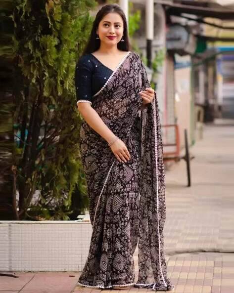 Women Floral Print Saree with Contrast Border
