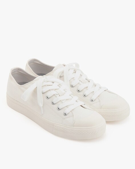 muji white sneakers