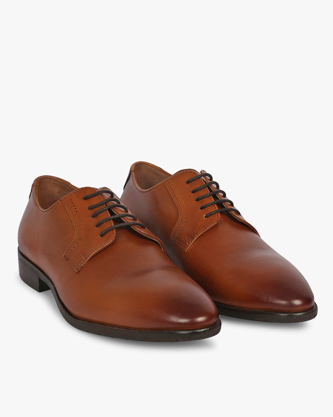 tan color leather shoes