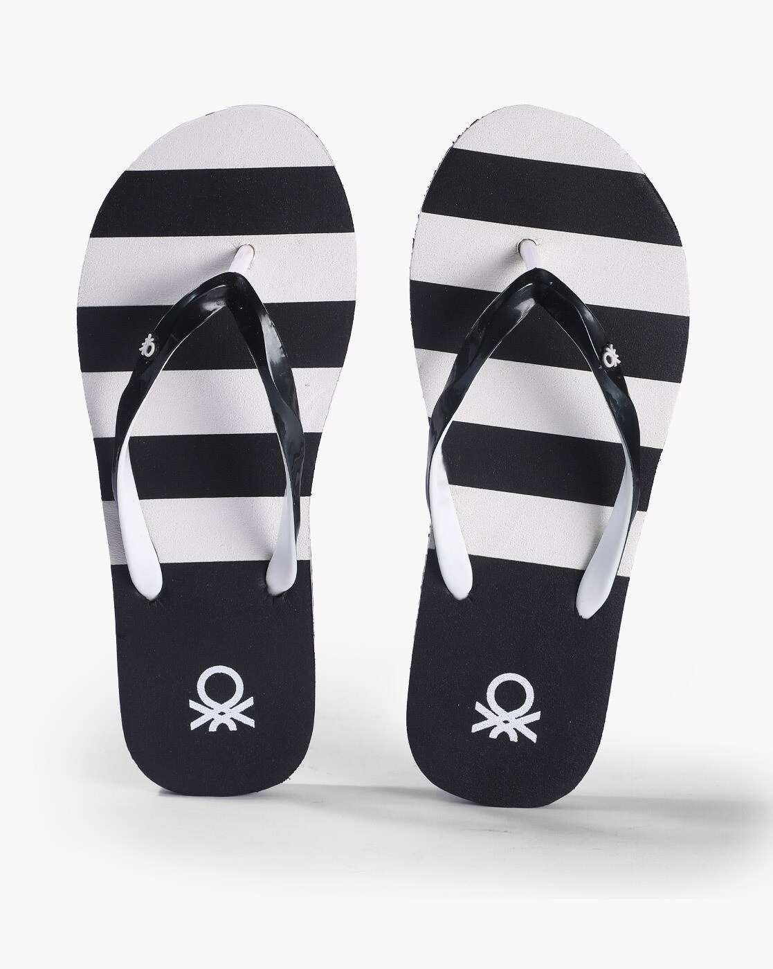 black and white flip flops