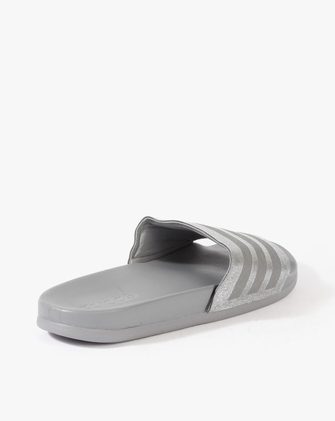 Adilette comfort outlet slides grey three