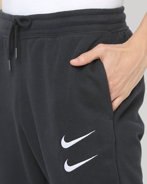 Jogging nike swoosh homme hot sale