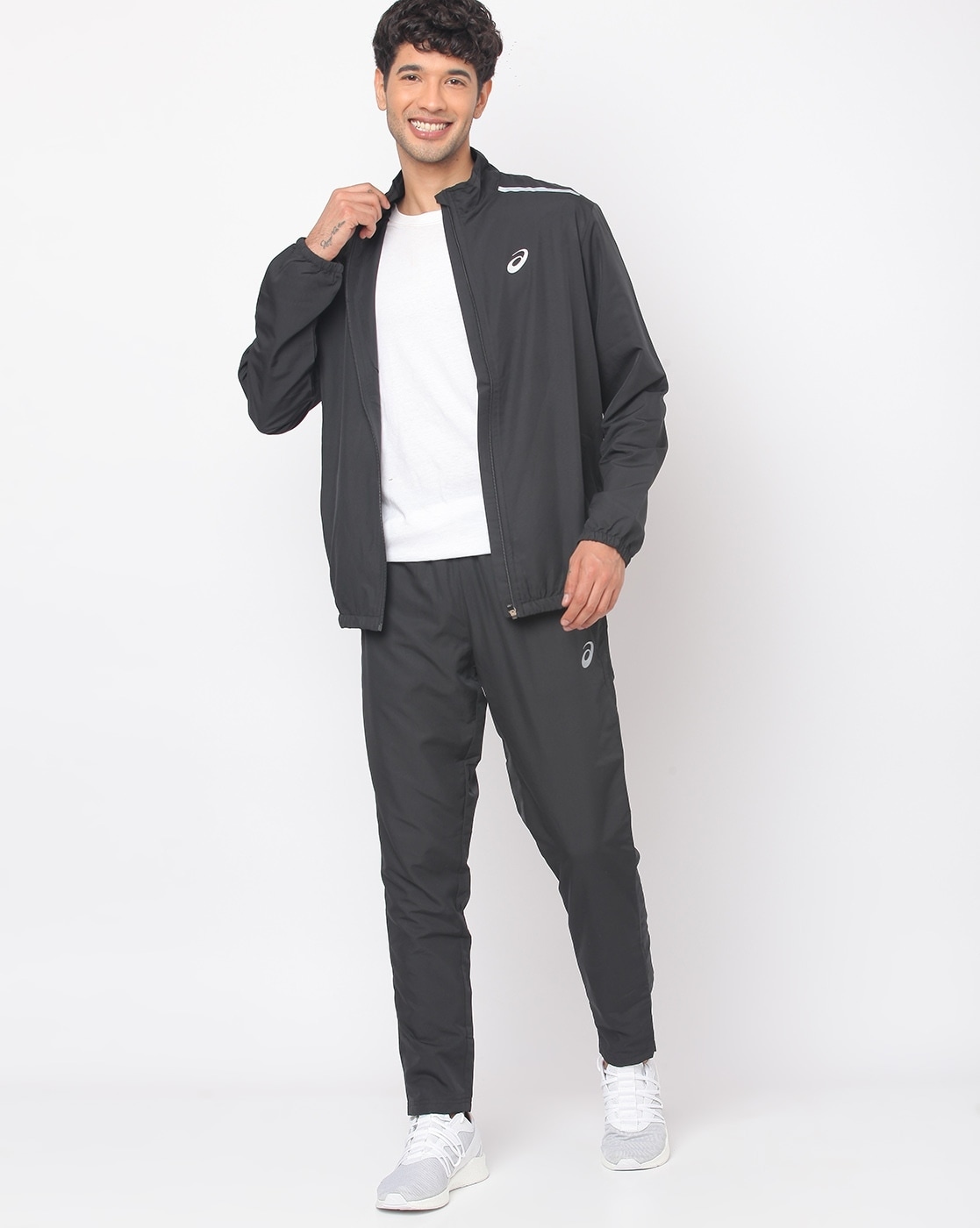 Buy Black Tracksuits for Men by ASICS 