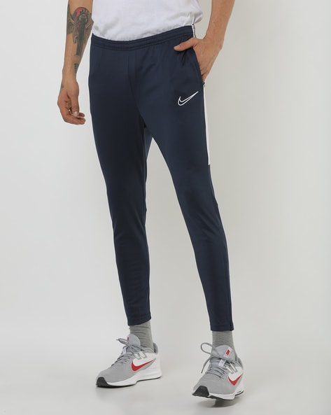 Nike slim fit track pants outlet