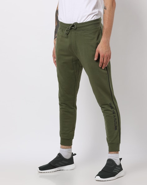 Buy Green Track Pants for Men by Campus Sutra Online | Ajio.com