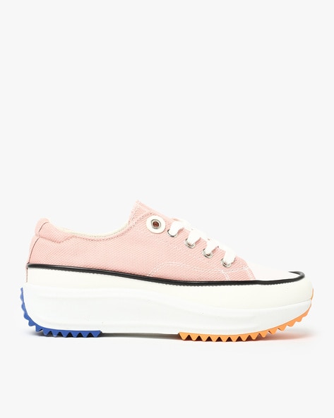 pink canvas shoes