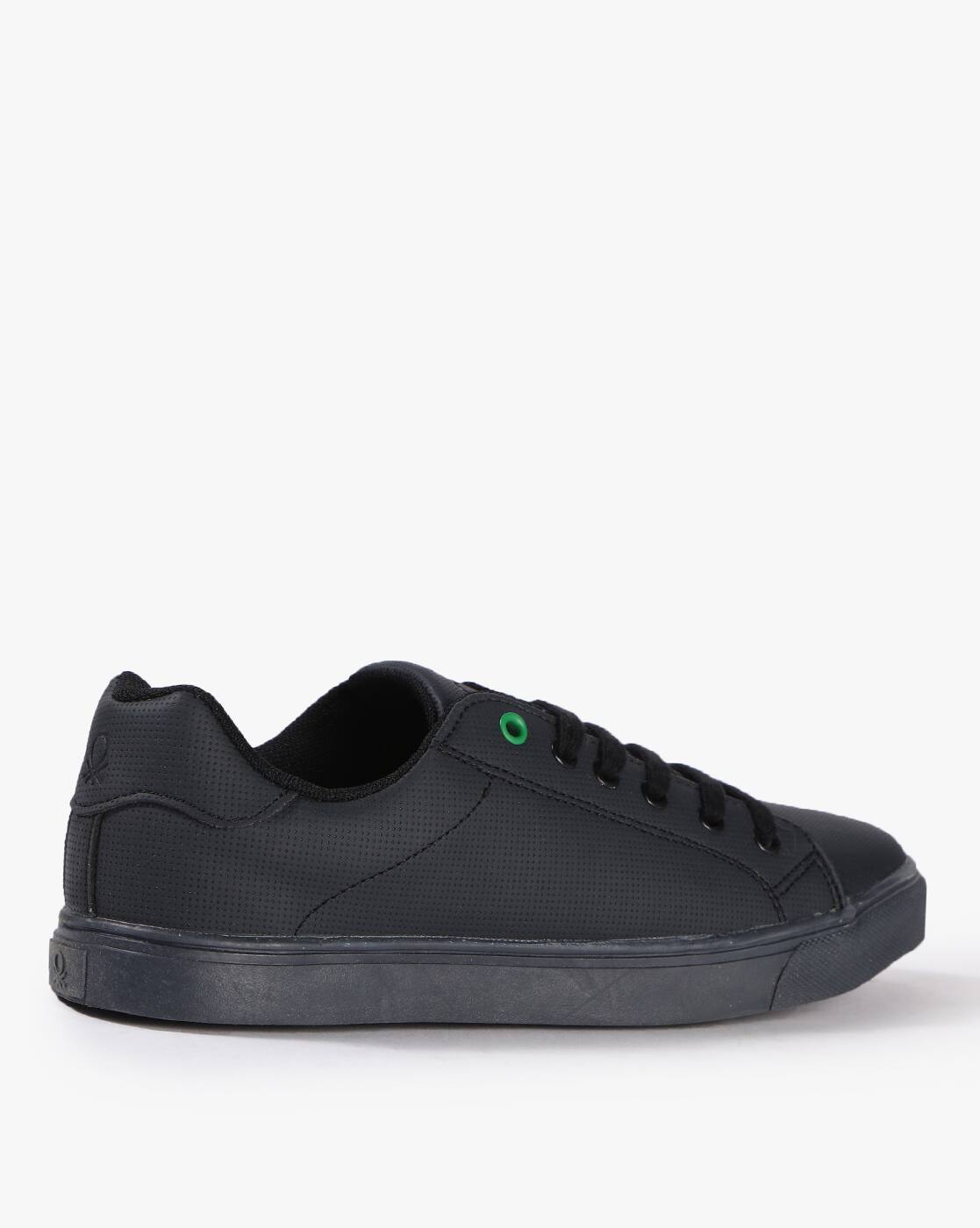 ucb black sneakers