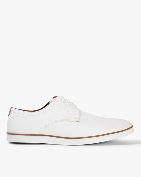 red tape white casual shoes
