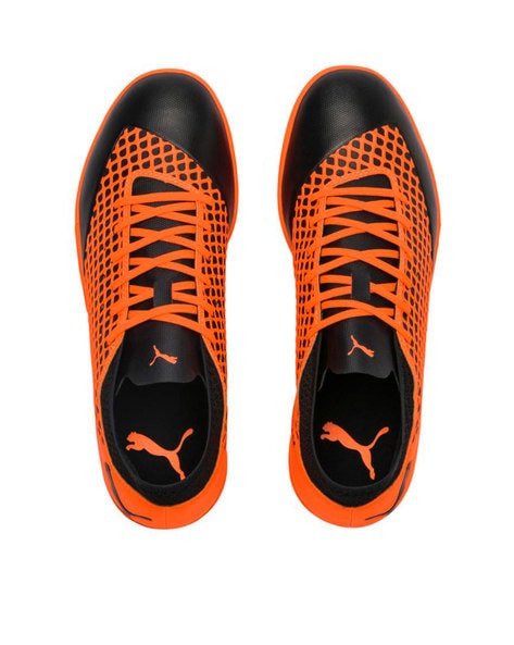 puma orange and black shoes