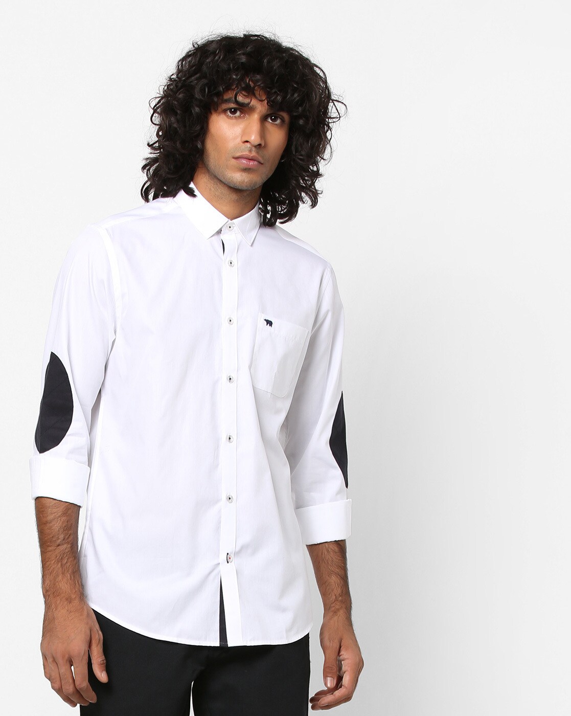 white shirt with elbow patches