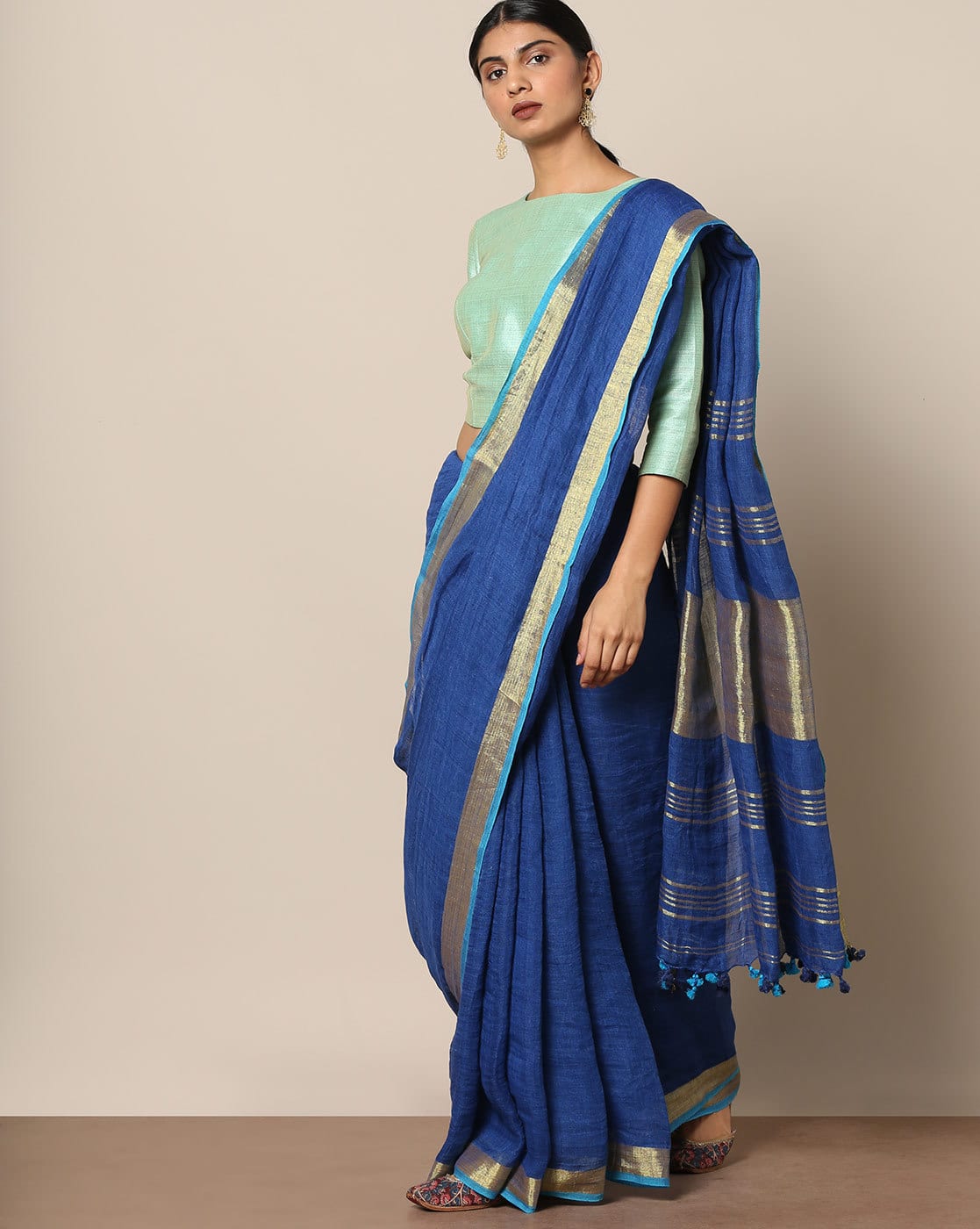 Handloom Pure Linen Saree with Pompoms Handloom Pure Linen Saree with Pompoms