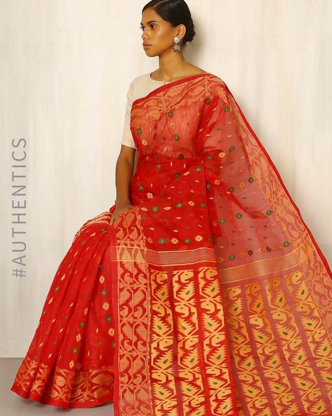 Bengali women in traditional jamdani and brocade saris