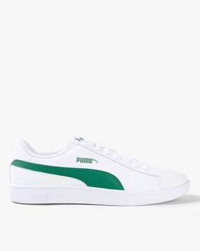 puma green and white shoes