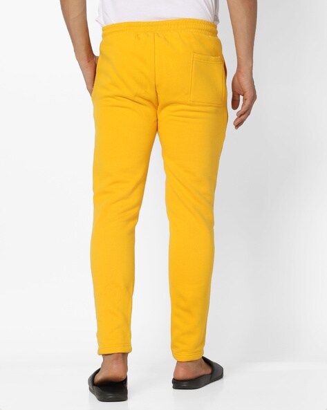 Buy Yellow Trousers & Pants for Men by UNITED COLORS OF BENETTON