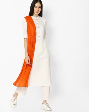 white dress with orange dupatta