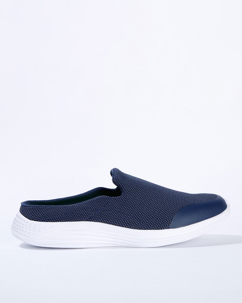 navy blue slip on sneakers