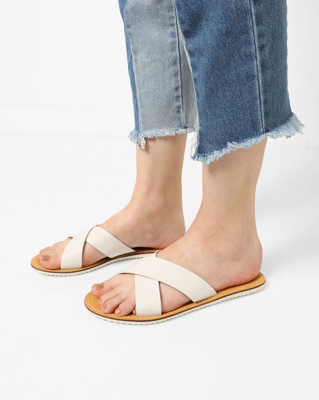 white criss cross slippers