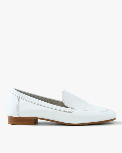 white flat loafers