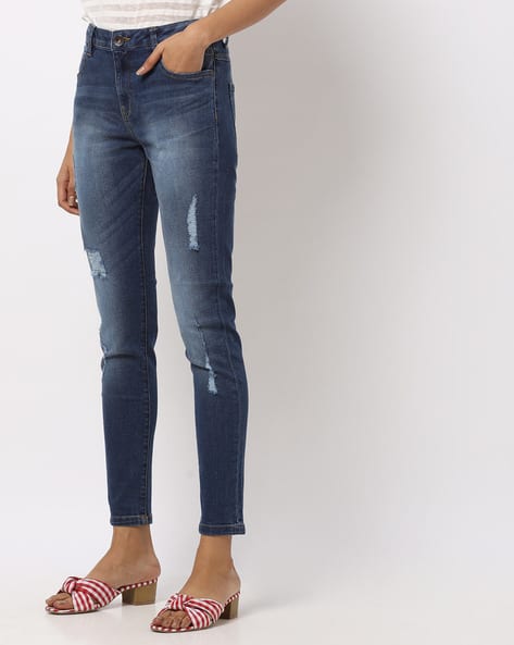 dark wash distressed skinny jeans