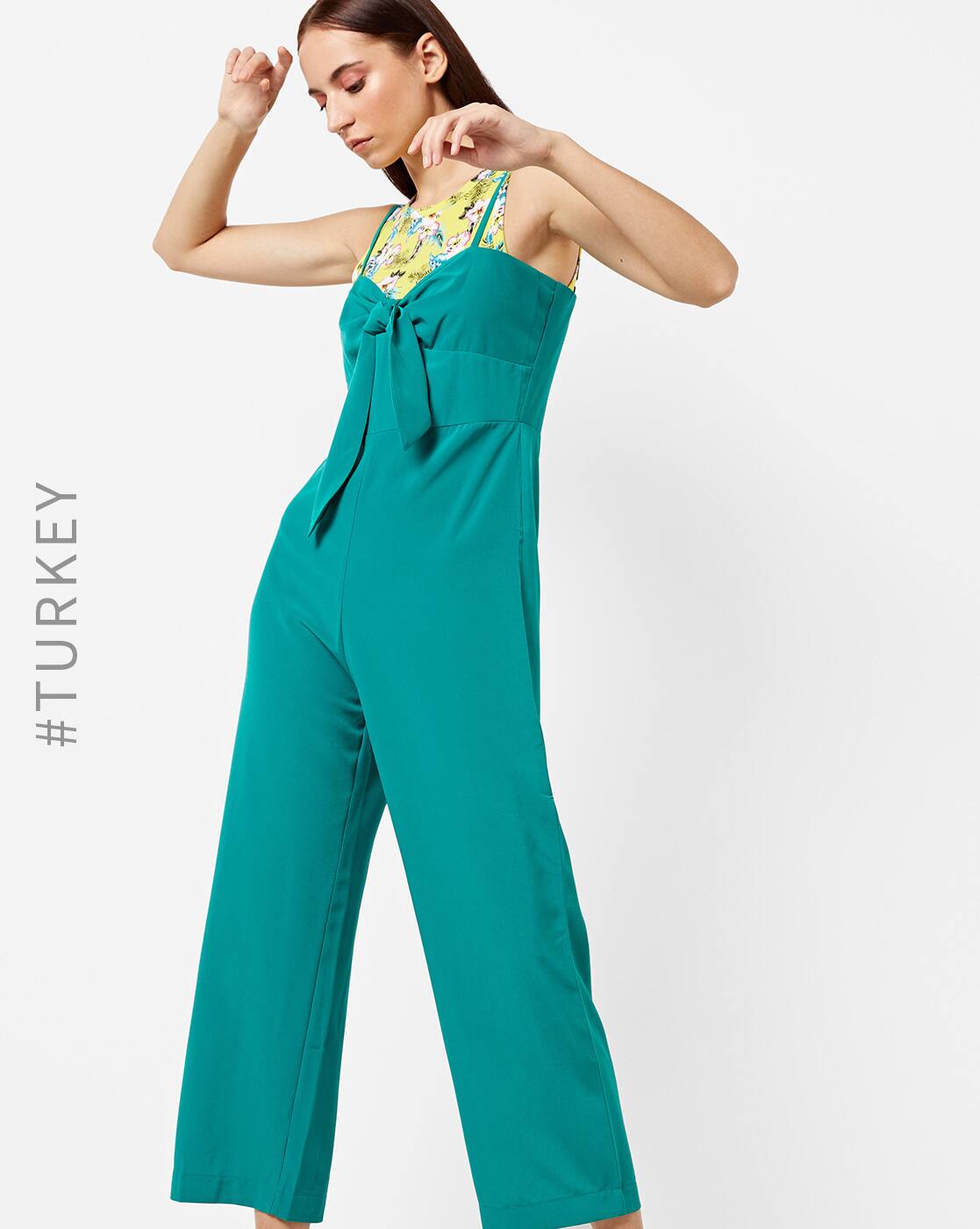 green strappy jumpsuit