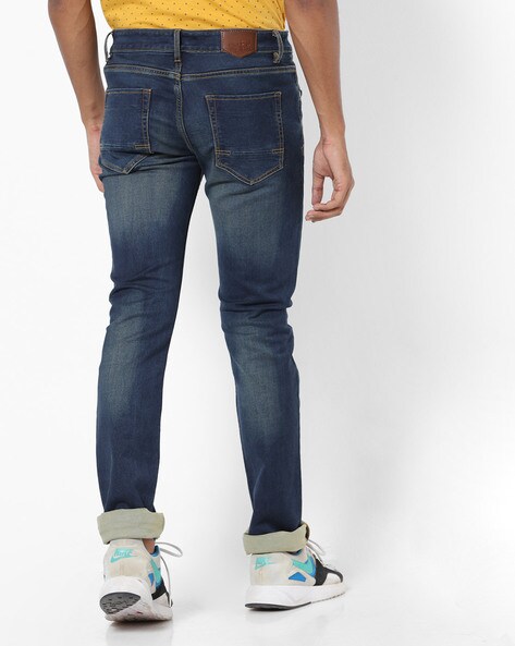 Mid-Rise Mid-Wash Slim Fit Jeans