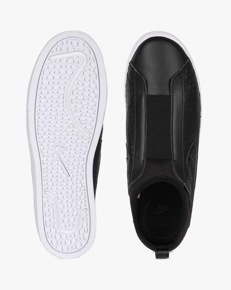 nike racquette leather