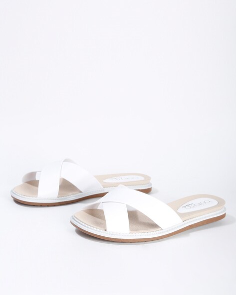 white criss cross slippers