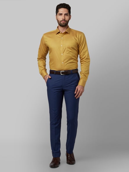 Escarvio - Yellow Shirt- 100 AED Dark blue Pants- 90 AED... | Facebook