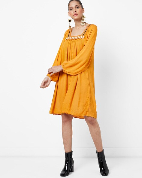 orange shift dress