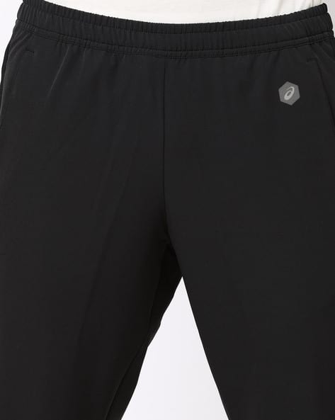 asics track pants under 500
