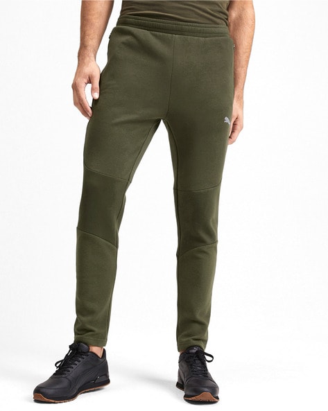 green puma pants
